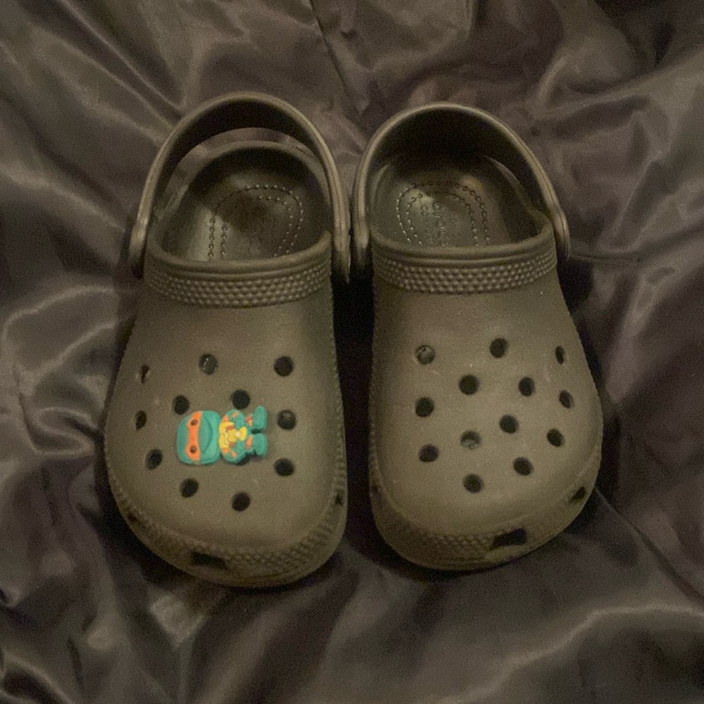 New black unisex toddler crocs. Size 9.